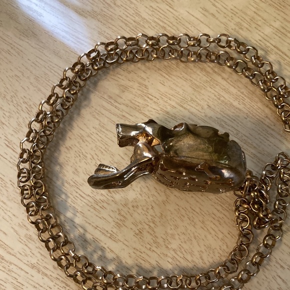 Somebody needs this gold color crystal brained scull necklace with sparkly eyes. - Picture 3 of 6